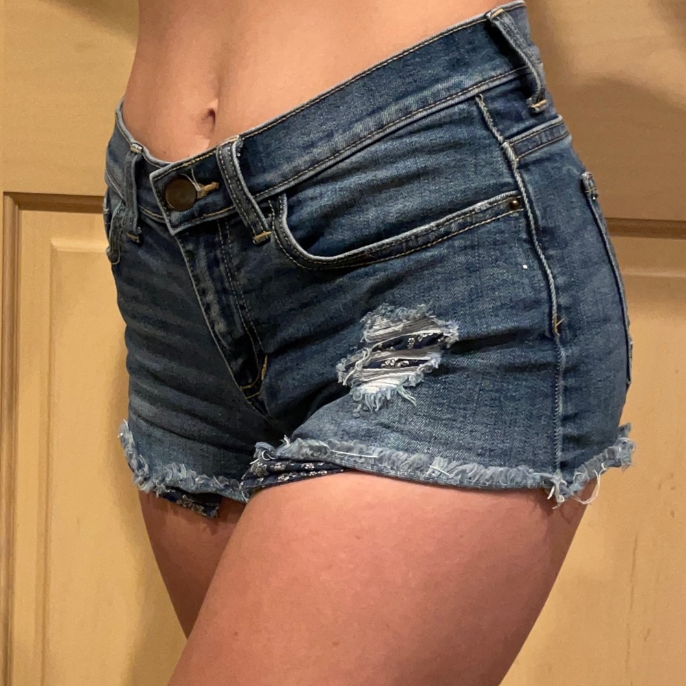 Flower Pocket Distressed Jean Shorts